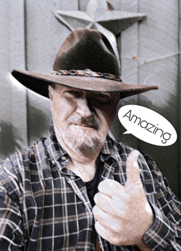 a man in a cowboy hat giving a thumbs up with a speech bubble saying amazing