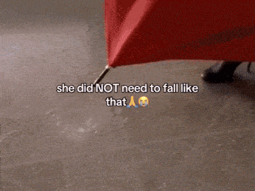 a woman in a red dress is standing on a concrete floor with the words she did not need to fall like that