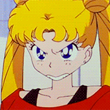 a close up of a cartoon girl with blonde hair