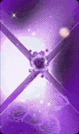 a purple background with a purple flower in the middle of it