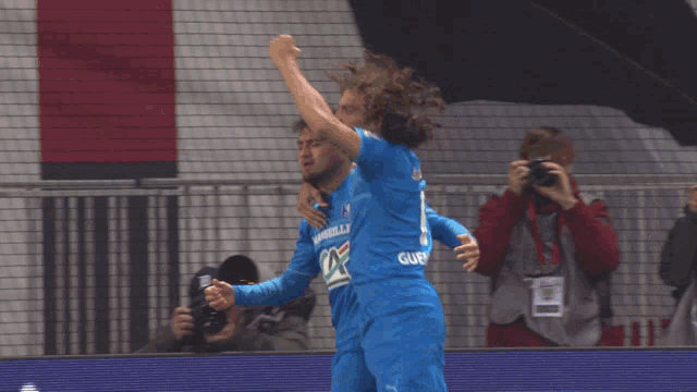 a soccer player with the number 5 on his shirt