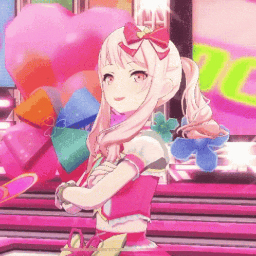 a girl in a pink dress with a red bow on her hair
