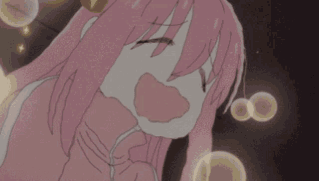 a cartoon girl with pink hair is making a sad face