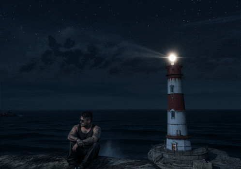 a man sits on a rock in front of a lighthouse