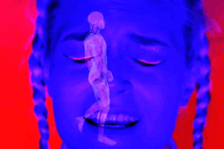 a blue and red image of a woman with the words heart attack on it