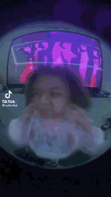 a tiktok video of a person eating a sandwich