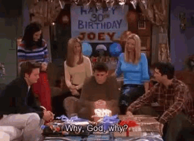a group of friends are celebrating joey 's 30th birthday with a birthday cake .