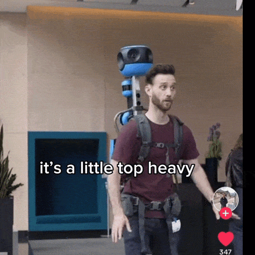 a man with a backpack says it 's a little top heavy on the bottom