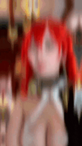 a blurred image of a woman with red hair and a collar on her neck .
