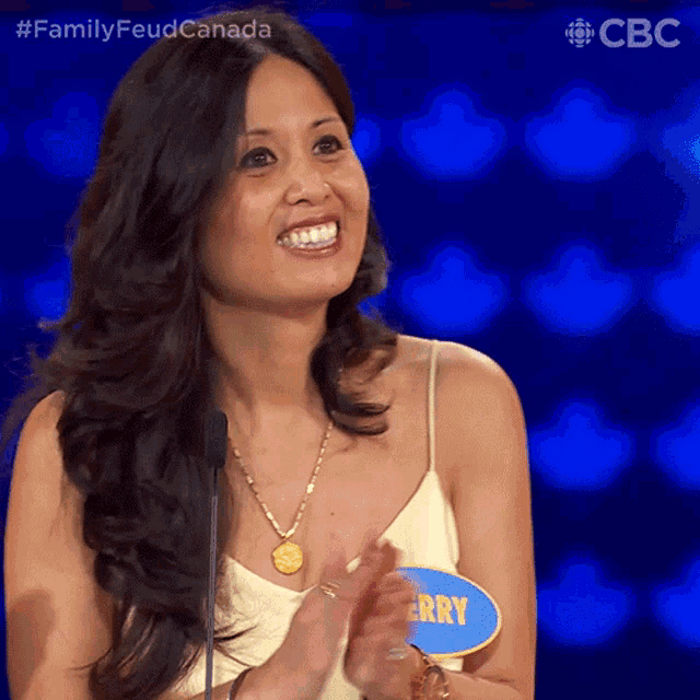 a woman wearing a name tag that says erry on it