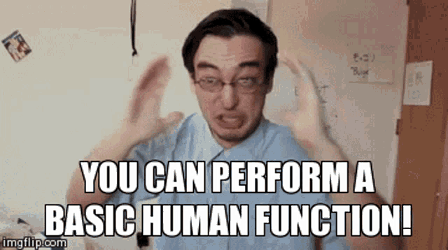 a man with glasses is saying you can perform a basic human function !