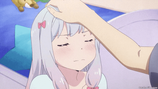 a person touching a girl 's forehead with a watermark that says onigiri anime