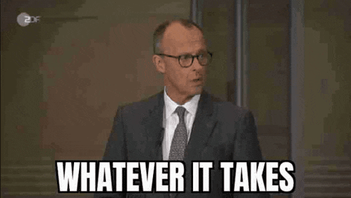 a man in a suit says whatever it takes