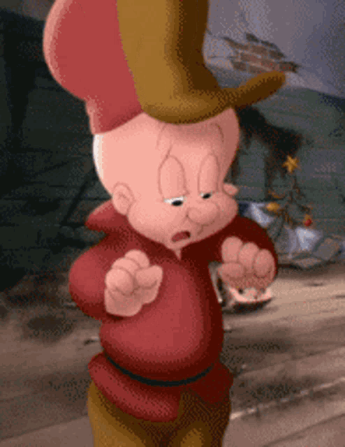 a cartoon character is wearing a top hat and a red jacket