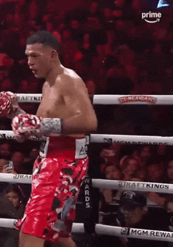 a boxer in a boxing ring with the word prime on the bottom