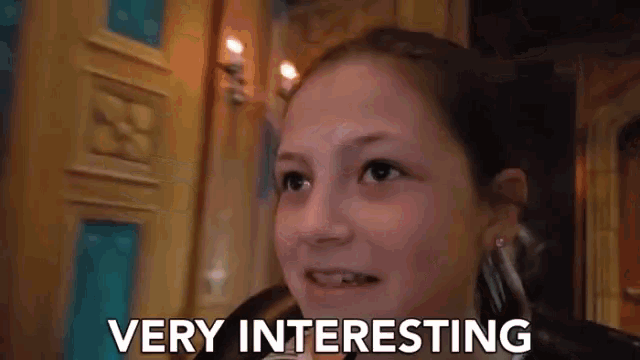 a young girl says " very interesting " while looking up