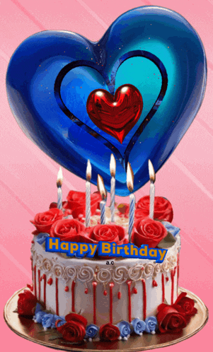 a birthday cake with roses and candles and a blue heart on top
