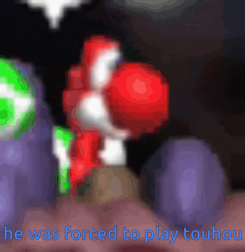 a blurred image with the words he was forced to play touhou in blue letters