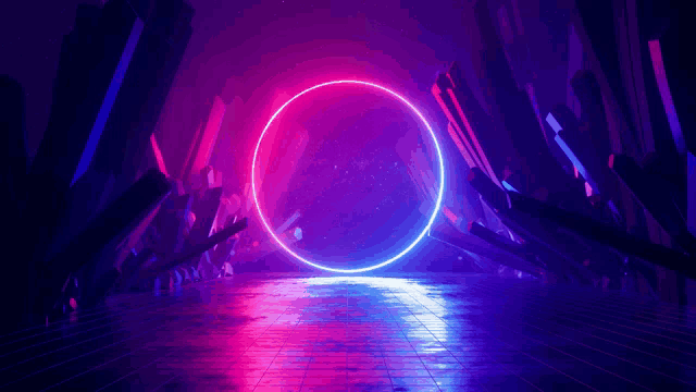 a neon circle is glowing in the dark in a dark room