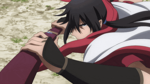 a man with long black hair is holding a red and black object