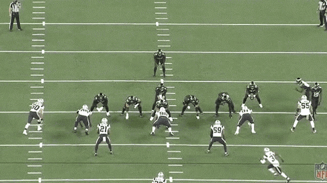 a football game is being played on a field that has the letters nfl on it
