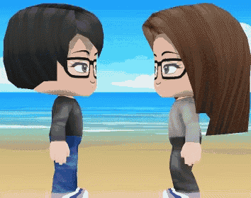a boy and a girl are standing next to each other on the beach