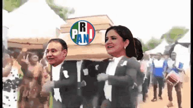 a cartoon of a man and woman carrying a coffin with the letters r pan on it