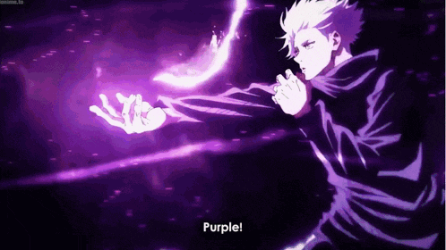 a person is holding a purple object in their hand and saying `` purple '' .