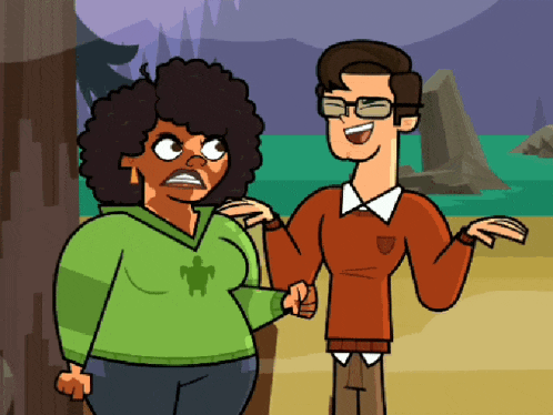 a man and a woman are standing next to each other on a beach