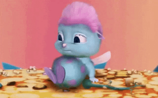 a cartoon character is sitting on a table with a microphone in its mouth .