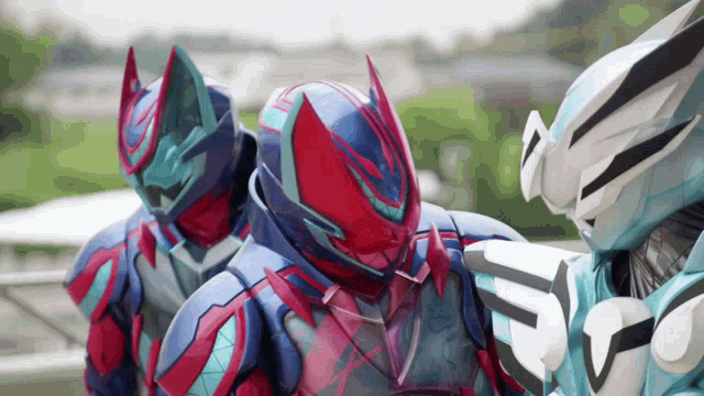 a group of superheros are standing next to each other and one of them is wearing a helmet with a cat head