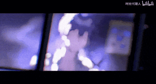 a blurry picture of a person 's face is being displayed on a computer screen .