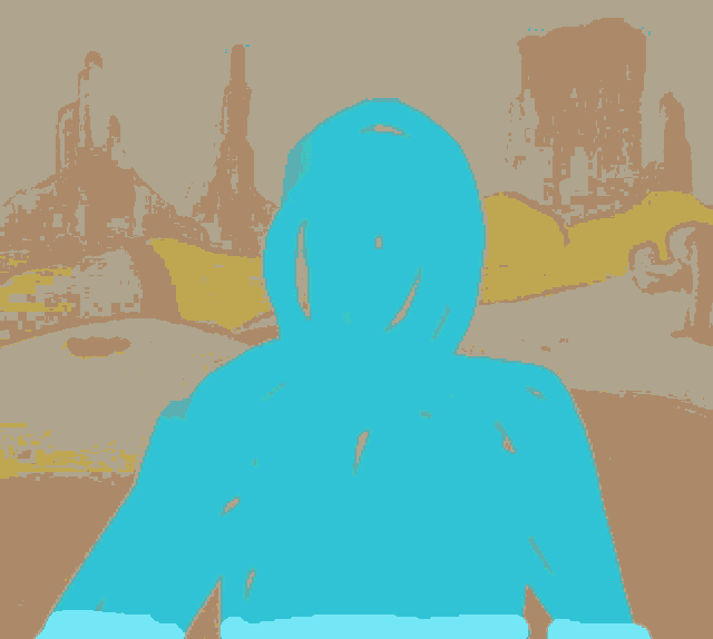 a pink silhouette of a person standing in the desert