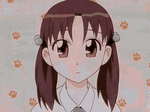 a close up of a girl 's face with paw prints in the background .