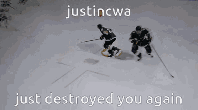 two hockey players on the ice with justincwa just destroyed you again above them