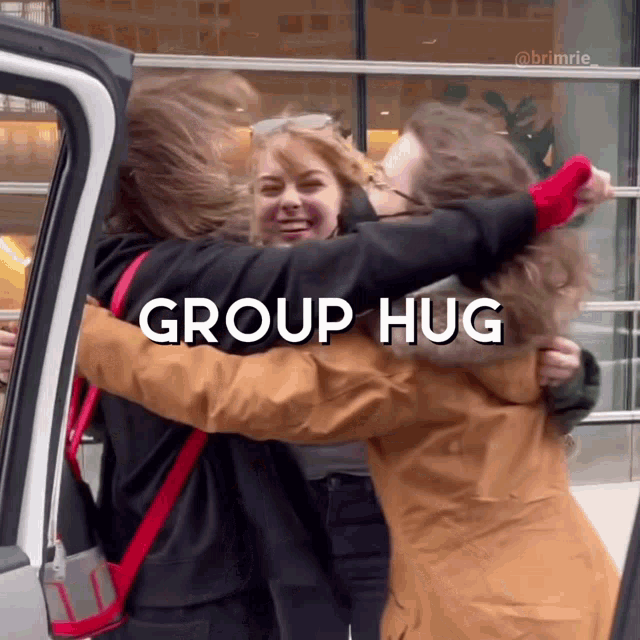 Hug Group Hug GIF - Hug Group Hug Aidan Gallagher GIFs