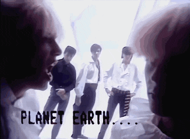 a group of people standing next to each other with the words planet earth written on the bottom