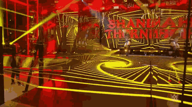 a stage with a sign that says shane thorne on it