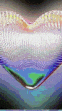a close up of a heart shaped object with a purple background
