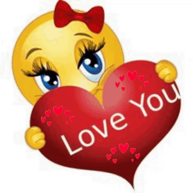a smiley face is holding a red heart with the words `` love you '' written on it .