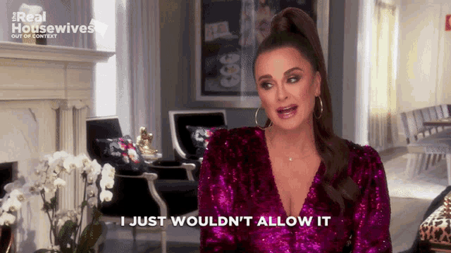 a woman in a purple sequined dress says " i just wouldn t allow it "
