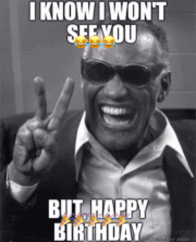 a black and white photo of a man giving a peace sign