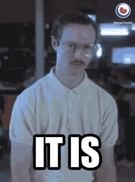 a man with glasses and a mustache has the word it is on his shirt