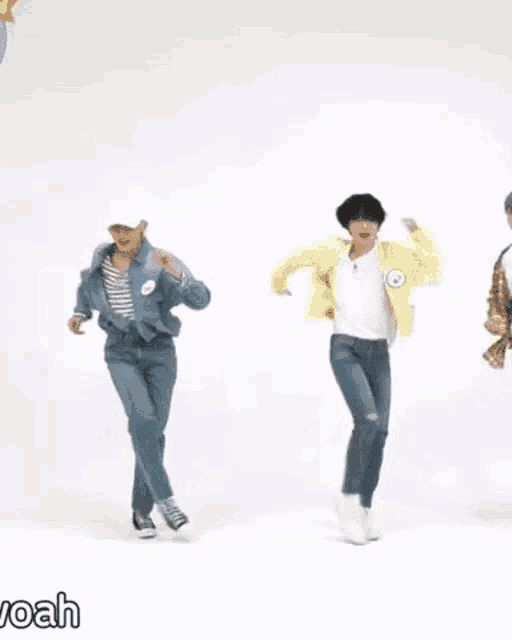 a group of people are dancing in front of a white background with the word noah in the corner .