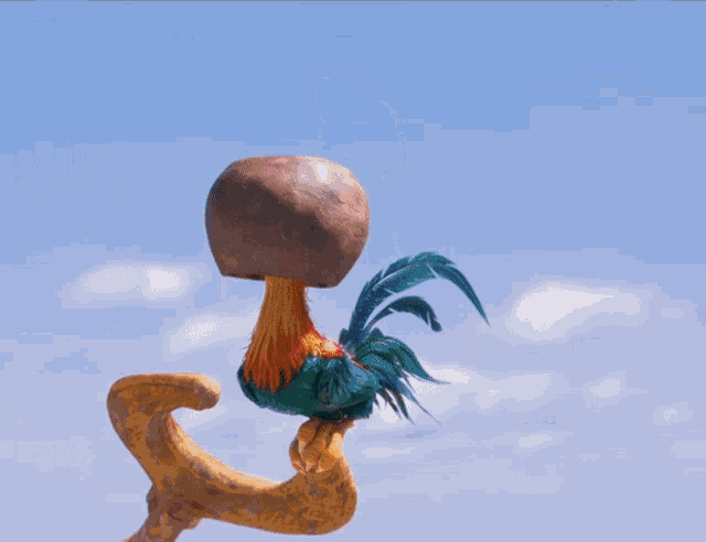 a cartoon rooster standing on a wooden stick with a coconut in the background
