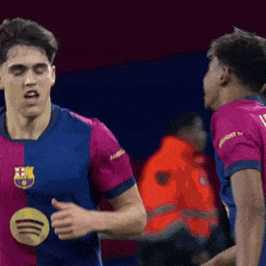 a soccer player wearing a shirt that says ' fcb ' on it