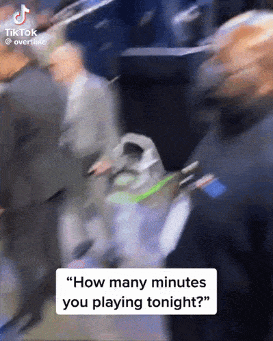 a blurred image of a crowd of people with a caption that says " how many minutes you playing tonight "