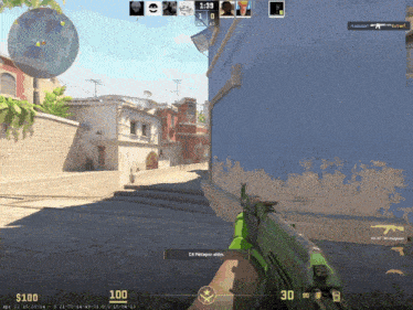 a screenshot of a video game with a green weapon and the number 30 on the screen