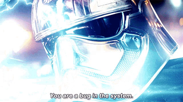 a close up of a helmet with the words " you are a bug in the system " below it