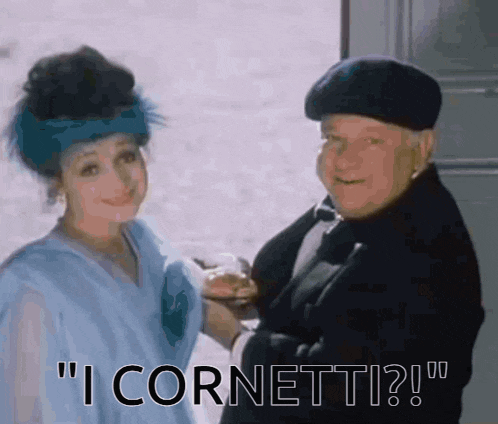 a man and a woman are standing next to each other and the man says " i cornetti ? "